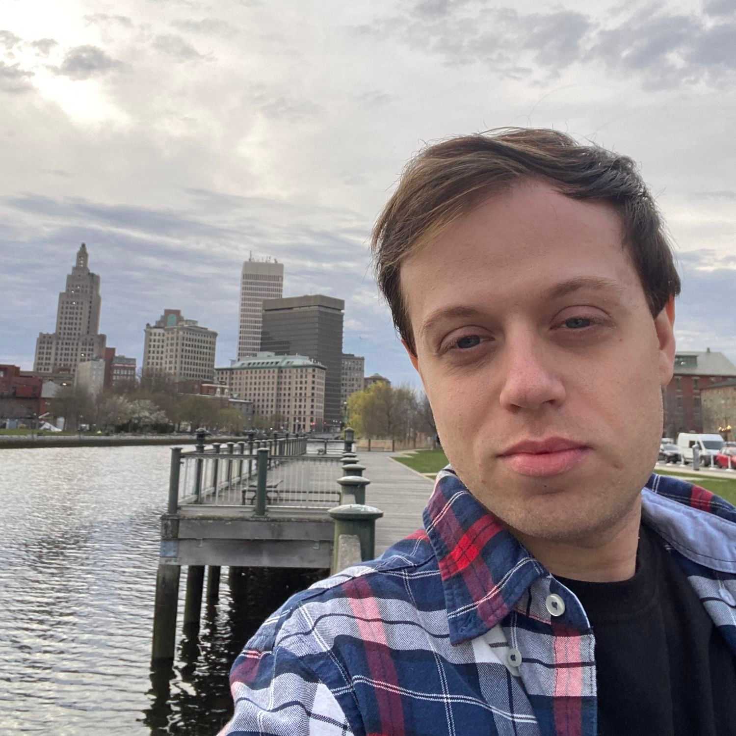 Portrait of Justin Rundio, a professional stylist at HairLab, showcasing their expertise and style.