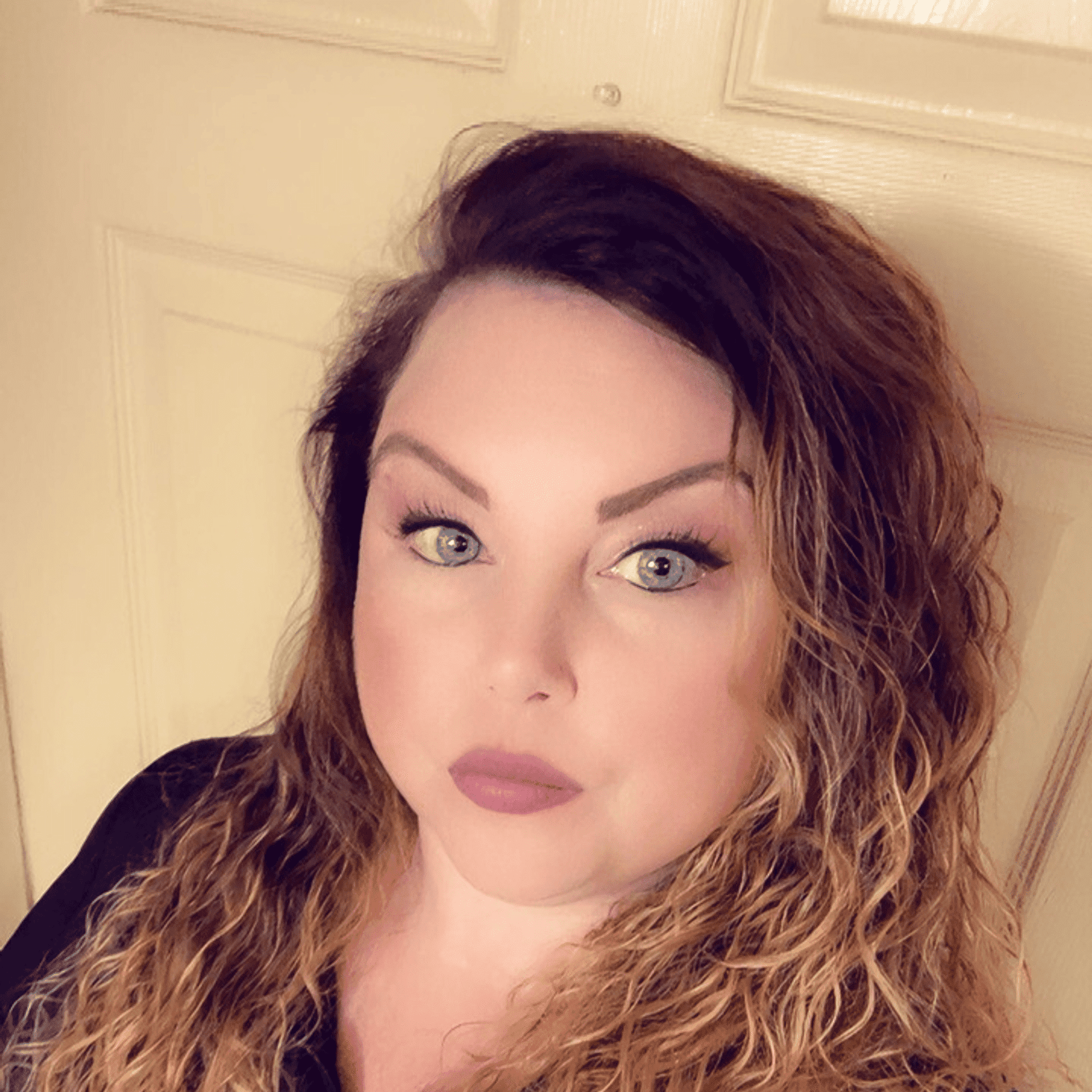 Portrait of Stephanie, a professional stylist at HairLab, showcasing their expertise and style.